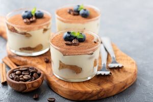 Classic,Tiramisu,In,A,Glass,On,A,Gray,Background.